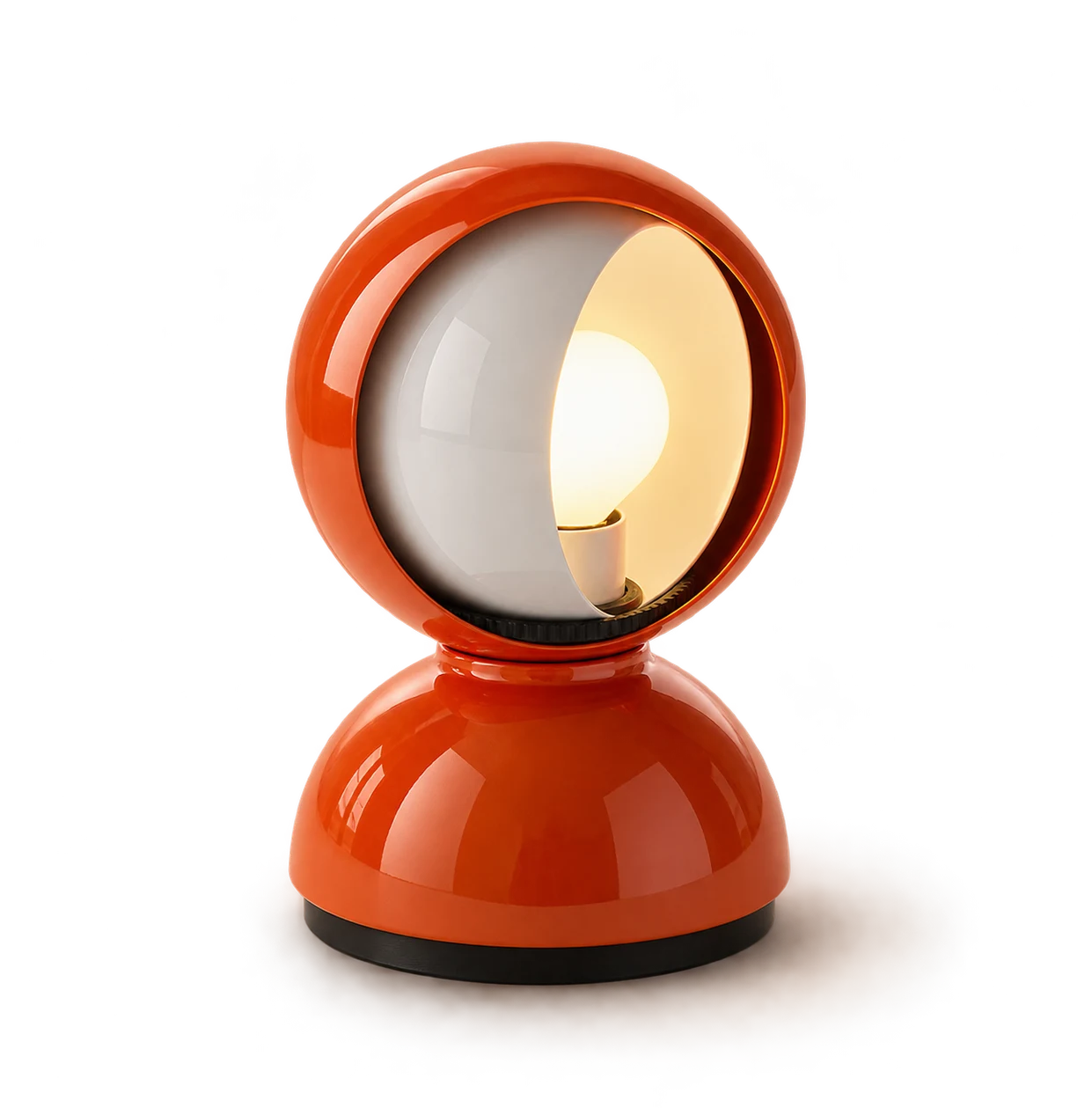 Orange Eclisse lamp glowing on a dark background